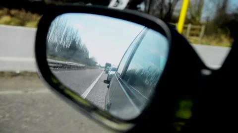 Looking into rear view mirror Vídeo Stock 50528568
