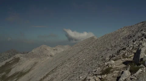 Looking at the Rocky Mountain Path Handheld 4K Stock Footage 67478624