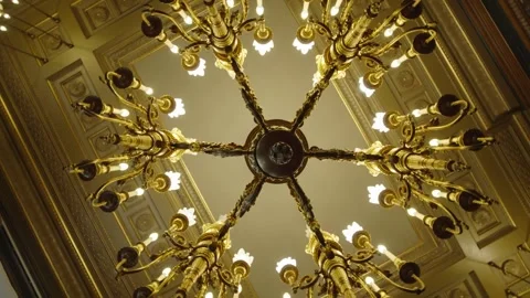 Looking Up Into Rotating Lit Chandelier In A Luxury House. Low Angle Video stock 167750054