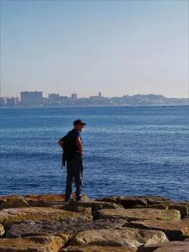 Looking at the sea Stock Photos