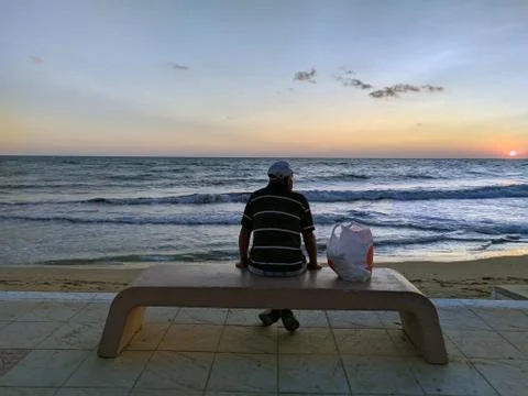 Looking at the sea Stock Photos