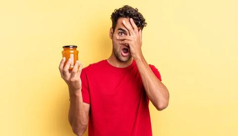 Looking shocked, scared or terrified, covering face with hand Stock Photos