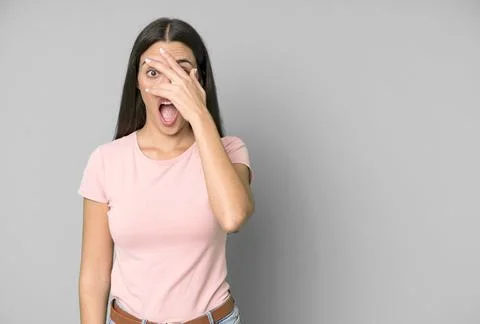 Looking shocked, scared or terrified, covering face with hand Stock Photos