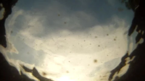 Looking at sky and going underwater Stock Footage 57718408