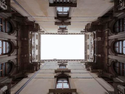 Looking up at the sky in a courtyard Stock Photos