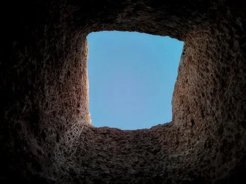 Looking at the sky from the deep well. Stock Photos