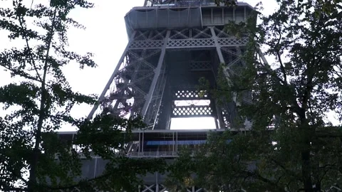 Looking Up Into The Skyline Of The Eiffel Tower In Paris, France. POV Stock Footage 230610673