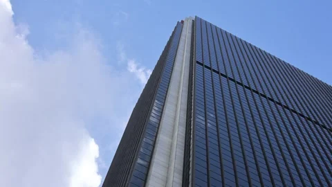 Looking Up At Skyscraper With Timelapse Clouds Passing Stock Footage 337679079