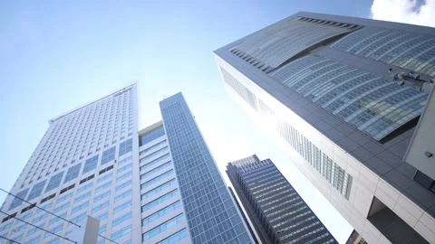 Looking up skyscraper in Tokyo. Beautiful sunny day. Stock Footage 220110617