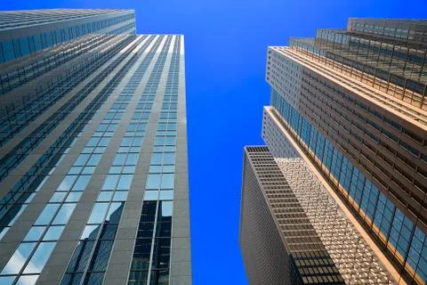 Looking up at the skyscrapers Stock Photos
