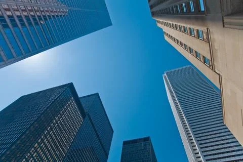 Looking up at the skyscrapers Stock Photos