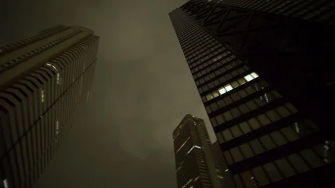 Looking Up Skyscrapers in Tokyo Stock Footage 107080141