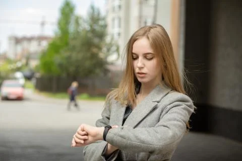 Looking on smartwatch Stockfoto's