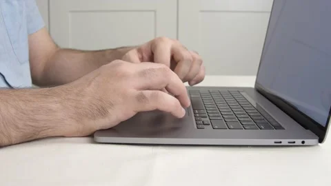 Looking for something on the Internet using the trackpad Stock Footage 169440602