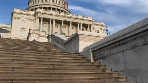 Looking up steps of the landmark U.S. Capitol building in Stock Footage 438503