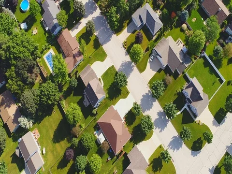 Looking straight down on nice neighborhoods in Springtime Stock Footage 77194903