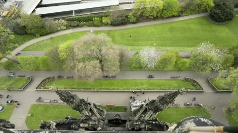 Looking straight down at people in Princess Gardens in Edinburgh Scott Monument Stock Footage 141668410