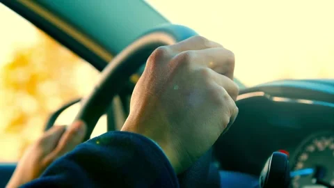 Looking the Sunset in a Car. view from inside a car with light from sun at Stock-Footage 336267600