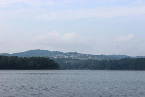 Looking at the surface of a large and beautiful mountain lake Stock Photos