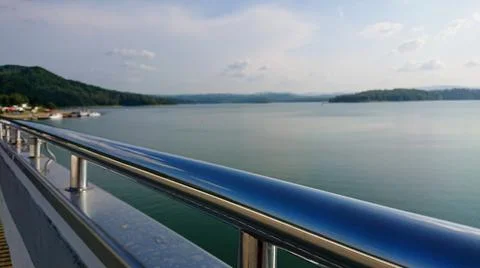 Looking at the surface of a large and beautiful mountain lake Stock Photos