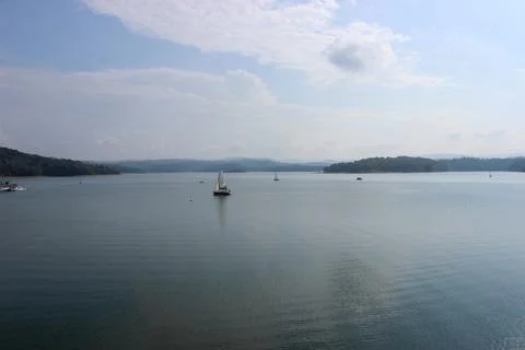 Looking at the surface of a large and beautiful mountain lake Stock Photos
