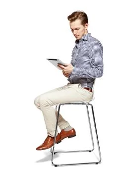 Looking at tablet Stock Photos