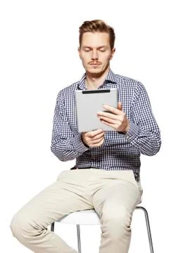 Looking at tablet Stock Photos