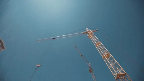 Looking on the tall yellow crane from below Stock Footage 143135543
