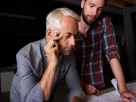 Looking at things from a different angle. two architects working together on a 스톡 사진