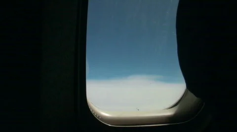 Looking through an airplane window 1 Stock Footage 369767