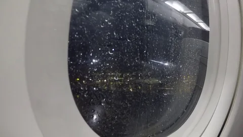Looking Through Airplane Window As It Prepares To Taxi For Take Off Video stock 83825883