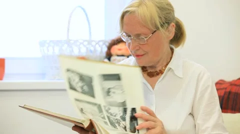 Looking Through An Album Video stock 52751349