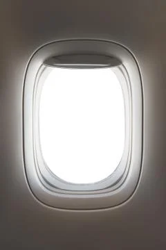Looking through a big jet passenger plane window, white space Stock Photos