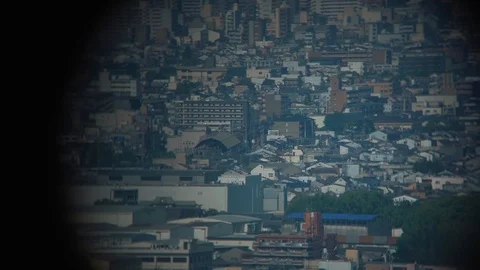 Looking through Binoculars at the city Stock Footage 111909536