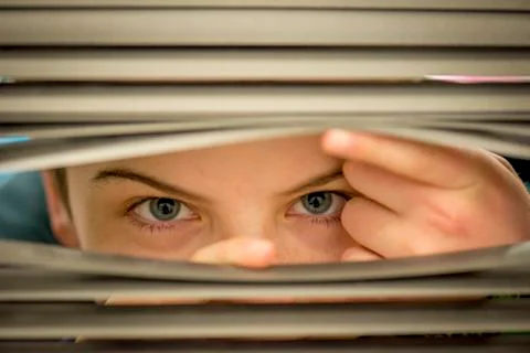 Looking through the blinds Stock Photos