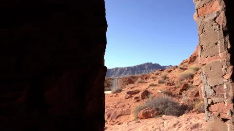 Looking through a cabin window onto a desert road. Stock Footage 155318011