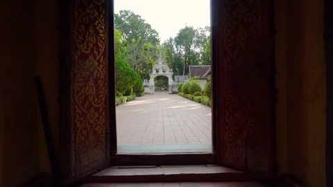 Looking through door on asian garden Stock Footage 83238057