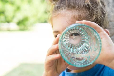 Looking through a glass Stock Photos