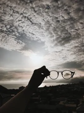 Looking through the glasses Stock Photos