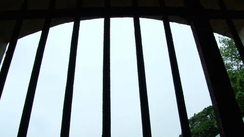 Looking through jail bars Devils Island Stock-Footage 76868568