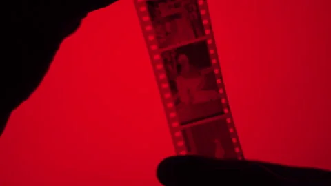 Looking Through Negatives original Stock Footage 266159470