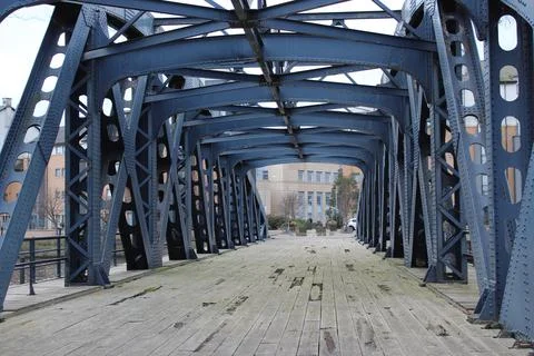 Looking through the old iron bridge. Stock Photos