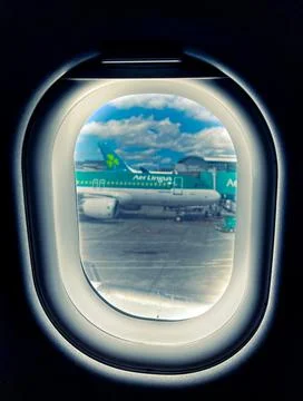 Looking through a plane window before taking off Stock Photos