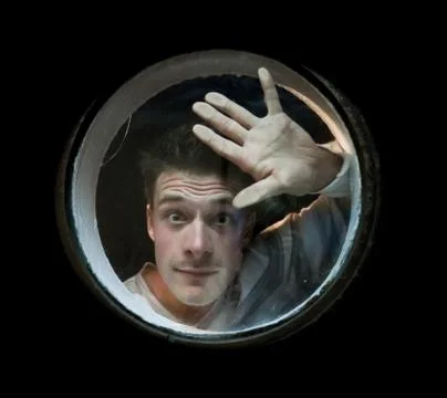 Looking through the porthole Stock Photos