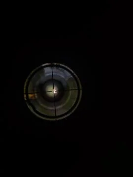 Looking Through a Rifle Scope at a Target Stock Photos
