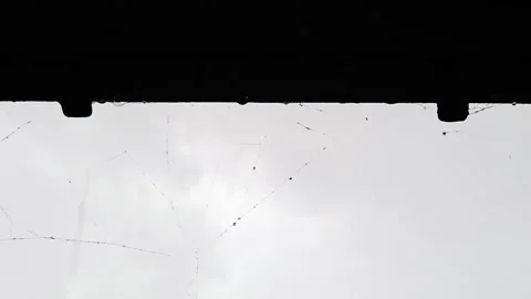 Looking Up Through Roof Window of Abandoned Trailer at Heavy Rain Stock Footage 339590410