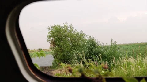 Looking Up Through Roof Window of Abandoned Trailer at Heavy Rain Stock Footage 339590694
