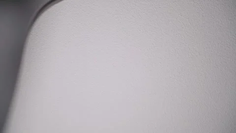 Looking up through spinning ceiling fan blades in slow motion Stock Footage 345733449