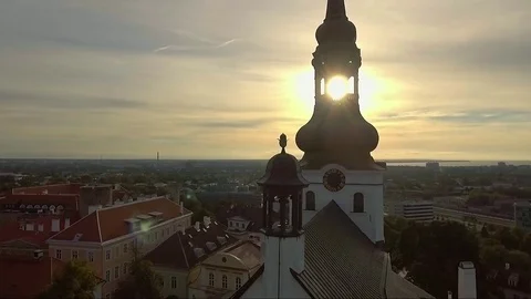 Looking through St Mary's cathedral tower into the sunset of Tallinn old town Stock Footage 82376410