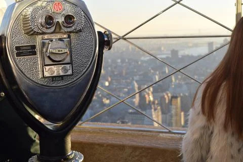 Looking through a telescope 写真素材